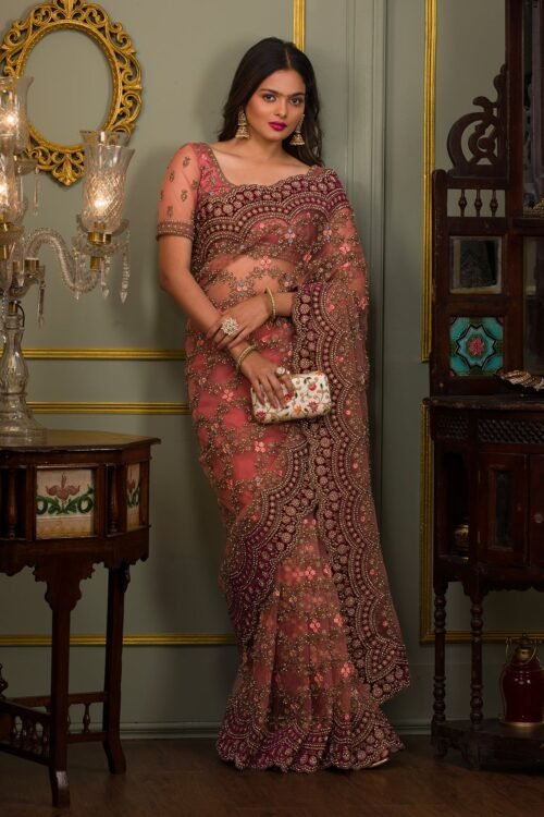 Elegant Peach Net Saree with Stonework Accents