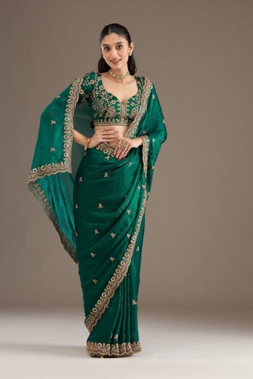 Exquisite Peacock Green Tissue Saree with Elegant Zariwork