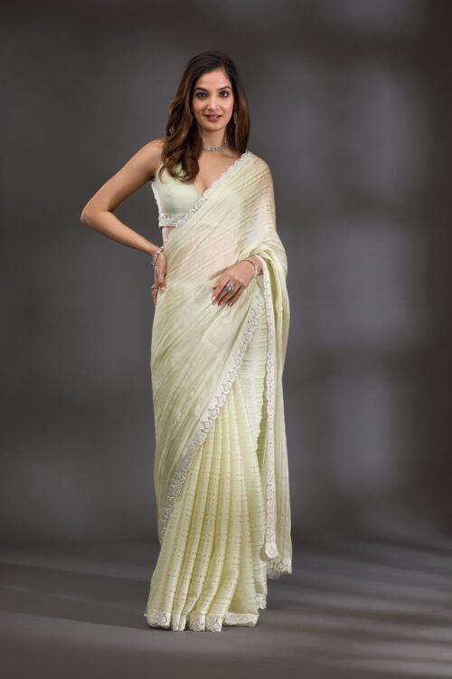 Elegant Pista Green Georgette Saree with Stunning Swarovski Accents