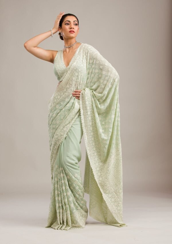 Elegant Pista Green Georgette Saree with Exquisite Threadwork