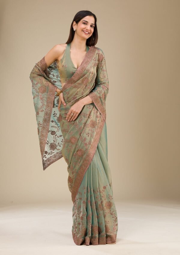 Elegant Pista Green Raw Silk Saree with Intricate Threadwork