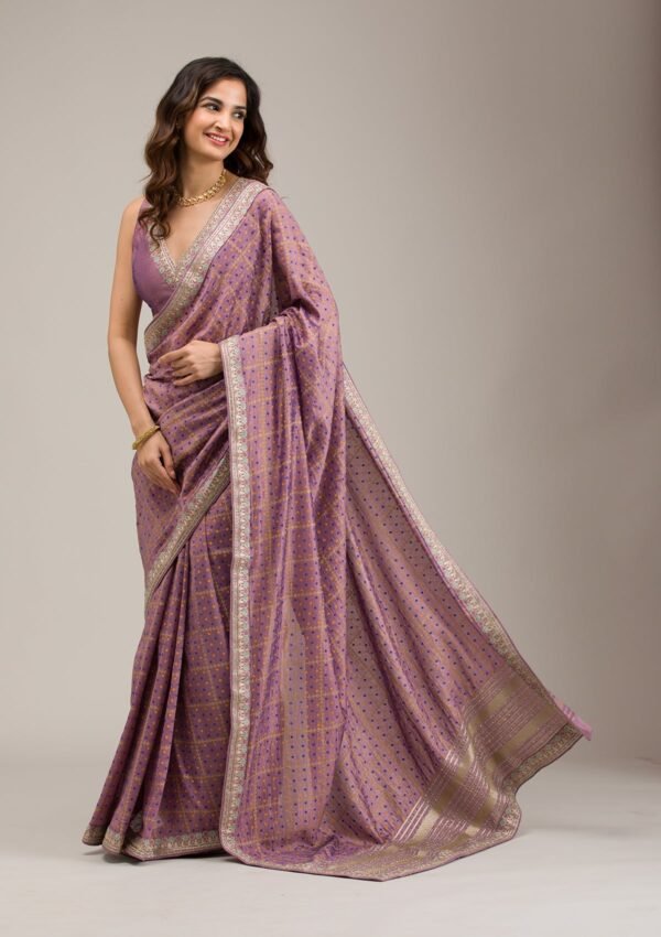 Luxurious Purple Zari Embroidered Soft Silk Saree