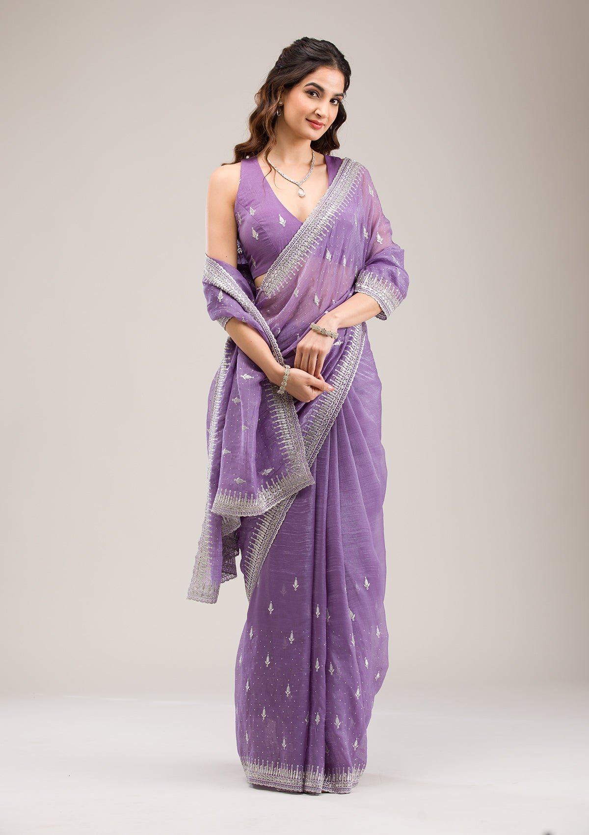 Exquisite Purple Tissue Saree with Zariwork Accents