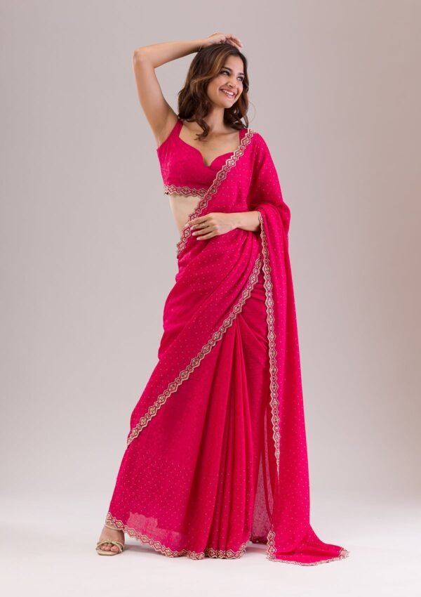 Elegant Rani Pink Stone Embellished Semi Crepe Saree