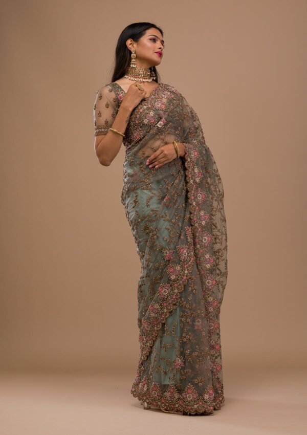 Elegant Sea Green Net Saree with Intricate Zari Work - Image 6