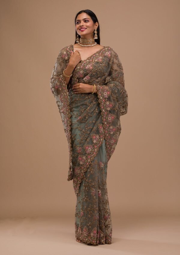 Elegant Sea Green Net Saree with Intricate Zari Work