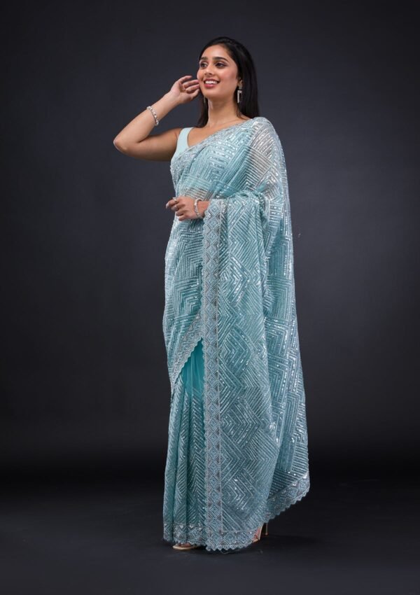 Exquisite Sky Blue Threadwork Net Saree for Elegant Occasions - Image 4