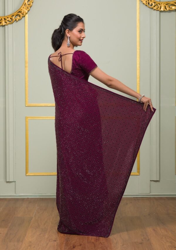Elegantly Crafted Wine Swarovski Crepe Designer Saree - Image 2